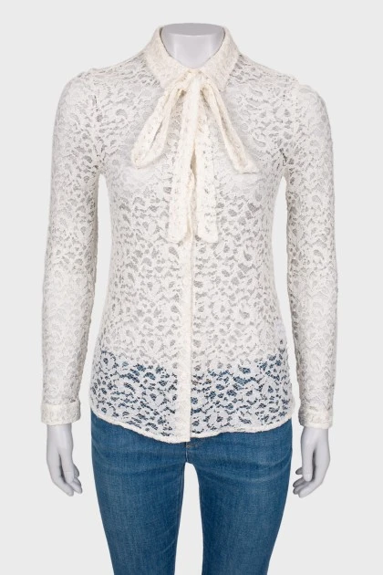 Lace blouse with slogan on the back