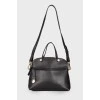 Black leather bag with lock