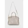 Gray leather bag with accessory