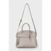 Gray leather bag with accessory