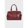 Burgundy leather handbag 