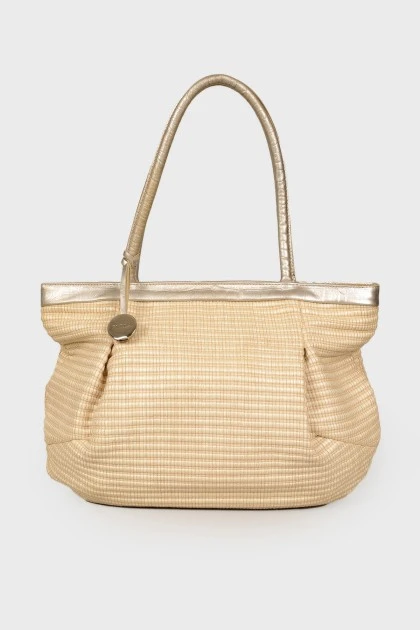 Wicker bag with leather handles