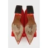 Red textile shoes with a bow