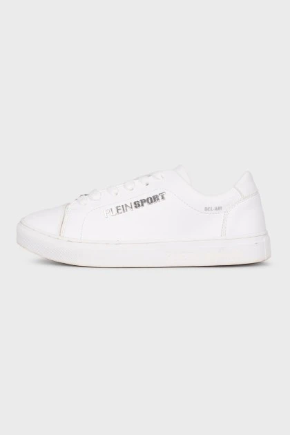 White sneakers with metallic brand logo