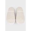 White mules with brand logo