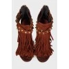 Suede sandals with long fringes
