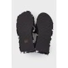 Black fur slippers with tag