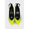 Green heeled shoes with tag