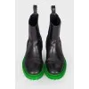 Men's boots with green soles