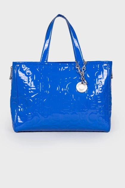 Lacquered blue bag with a metal keyring