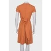 Orange pleated dress