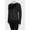 Cashmere sweater with feathers