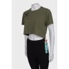 Green crop top with tag
