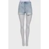 Light colored striped denim shorts with tag