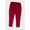 Children's red trousers with a textured pattern
