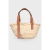 Straw bag with leather handles