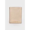 Golden wallet with brand logo