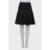 Black textured skirt with tag
