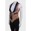 Vest with fringes and tassels