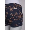 Shorts with golden embroidery