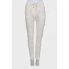 White fishnet trousers