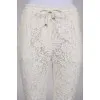 White fishnet trousers
