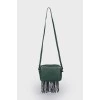 Fringed leather bag with tag