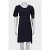 Dark blue dress with asymmetry at the bottom