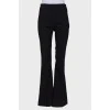 Black wool flared trousers