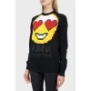 Black sweater with a big yellow smiley face