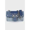 Leather bag with denim