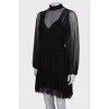 Black translucent dress with ruffles