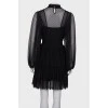 Black translucent dress with ruffles
