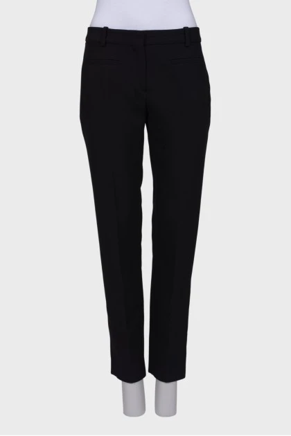 Classic trousers with decorative pockets
