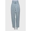 Light blue trousers with belt