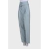Light blue trousers with belt