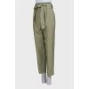 Green trousers with belt
