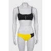 Yellow and black swimsuit with tag