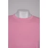 Pink T-shirt with shoulder pads and tag