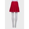 Red perforated skirt