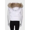 Vest with fur on the hood
