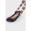 Black leather ballet flats with ties