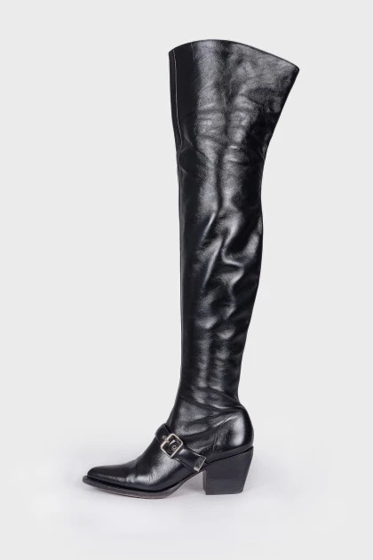 Leather over the knee boots with a strap