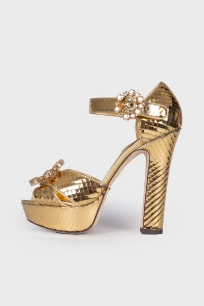 Golden sandals with rhinestones