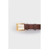 Men's leather belt with golden hardware