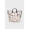 Beatrice Mural bag with tag