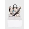 Beatrice Mural bag with tag