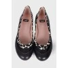 Black and white leather ballerina shoes