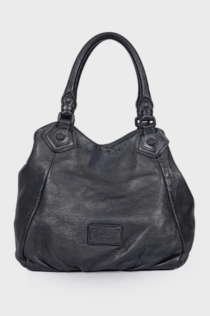 Leather bag with brand logo