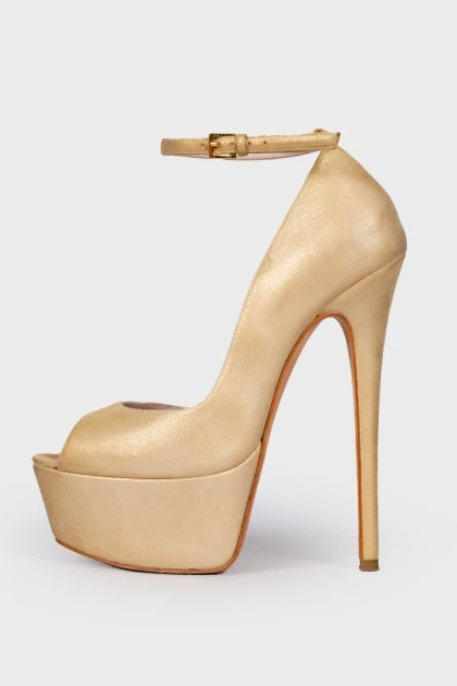 Golden high heels
